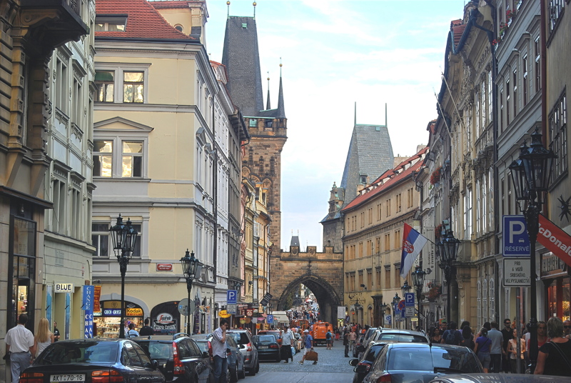 14 - Mostecká Street in Prague, Czech Republic, looking toward the historic Malá Strana Bridge Towers and the entrance to the Charles Bridge